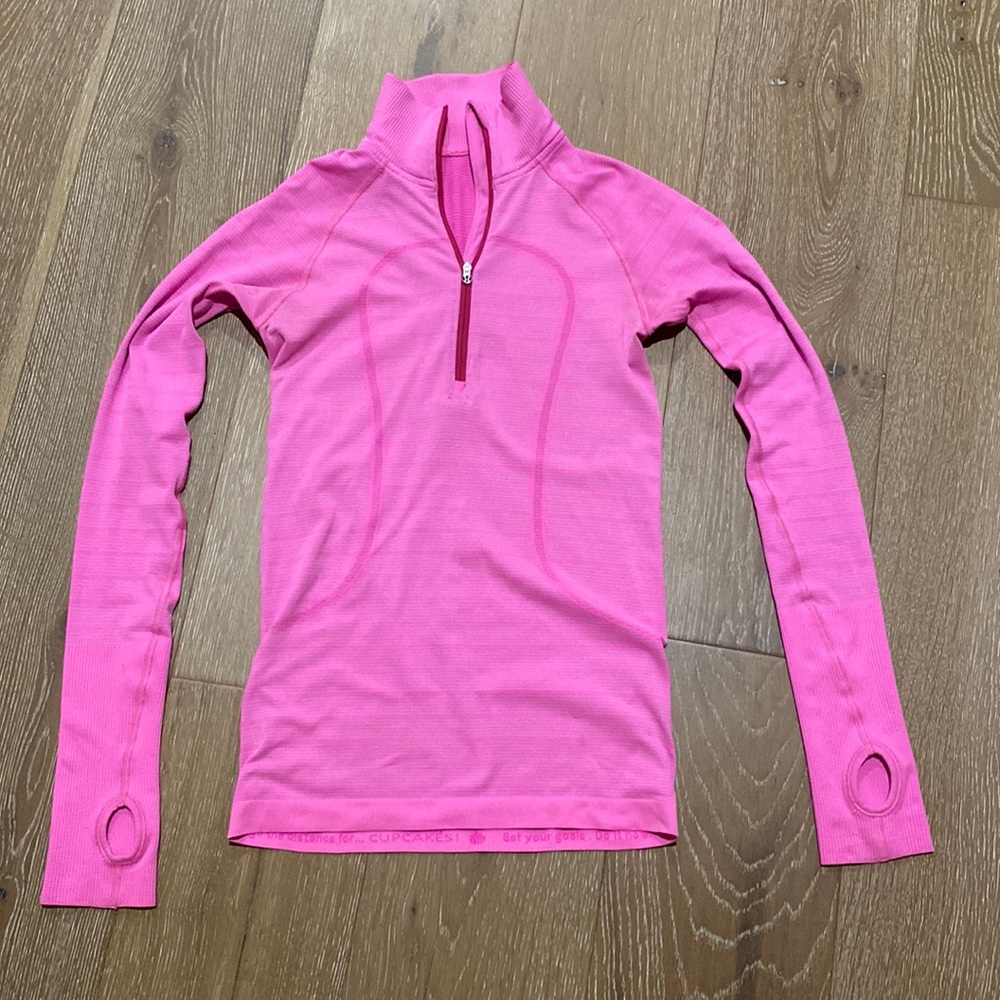 Lulu lemon pink swiftly tech 1/2 zip!  Brand new w out tags!! Very cute! Size 4